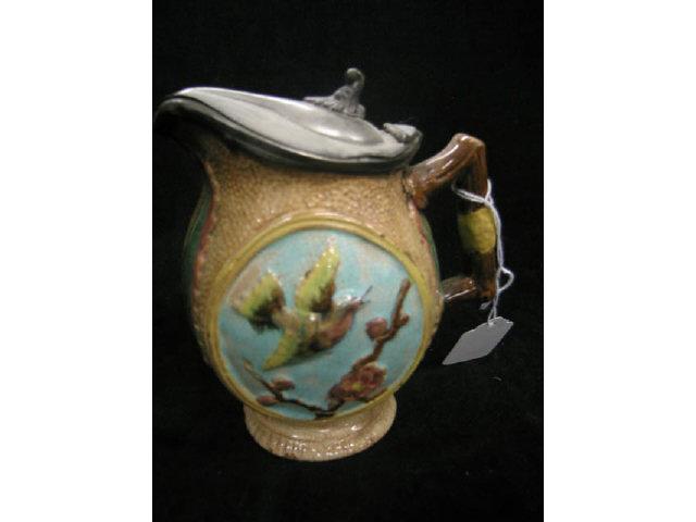 Appraisal: Majolica Pottery Syrup Pitcher bird floral