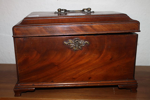 Appraisal: A GEORGIAN MAHOGANY TEA CADDY with gilt metal handle and