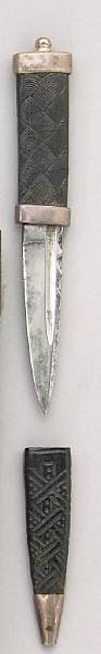 Appraisal: A Highland skein dhumid- th century Straight inch blade with