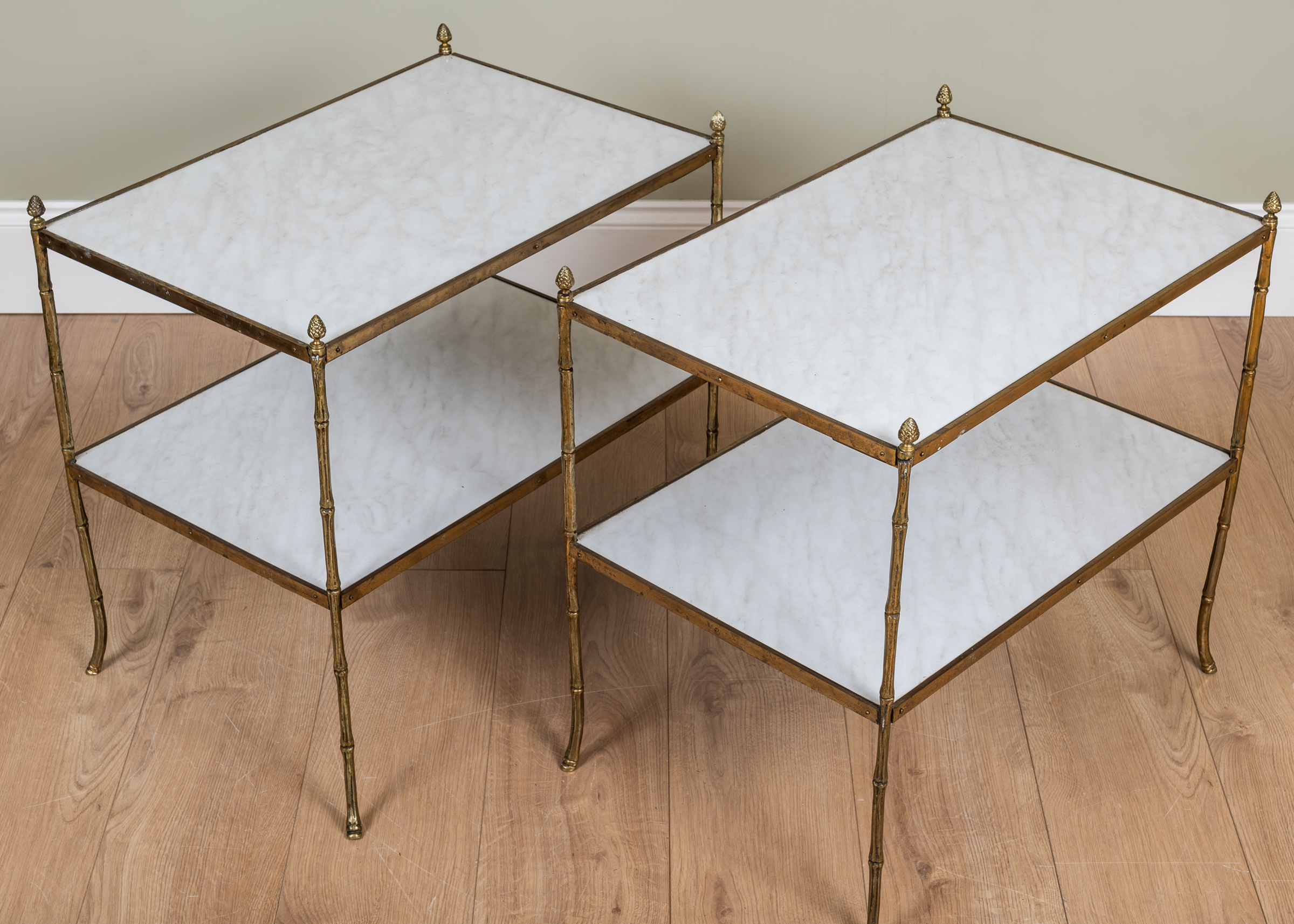 Appraisal: A pair of brass rectangular occasional tables with FAUX marble