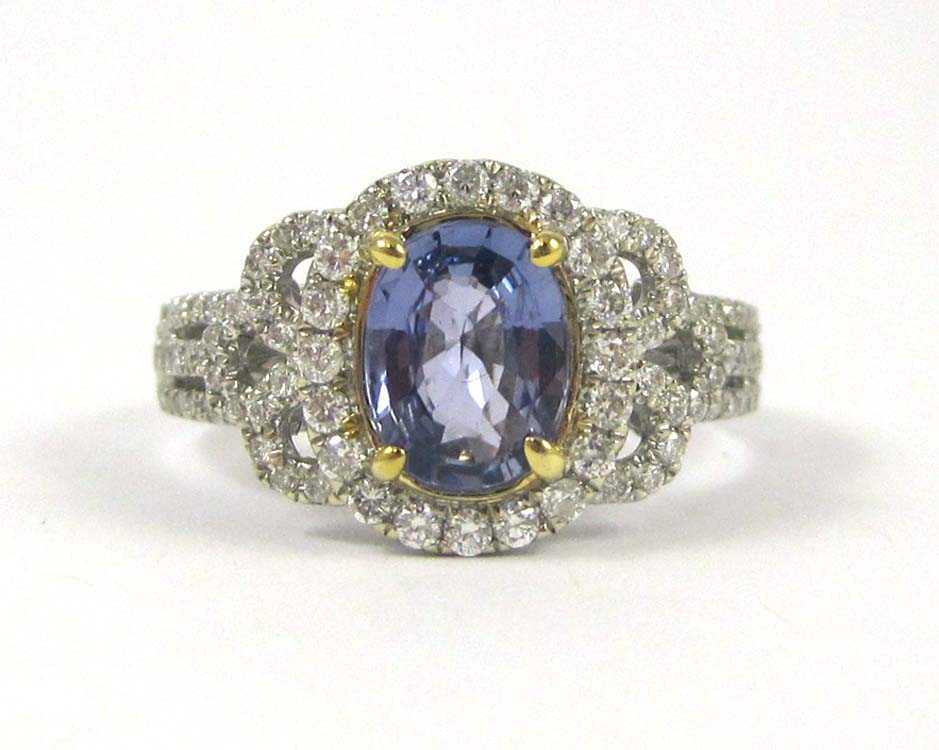 Appraisal: BLUE SAPPHIRE DIAMOND AND FOURTEEN KARAT GOLD RING having approximately