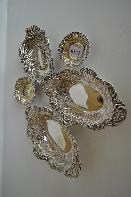 Appraisal: A GROUP OF FIVE PIERCED AND EMBOSSED STERLING SILVER DISHES