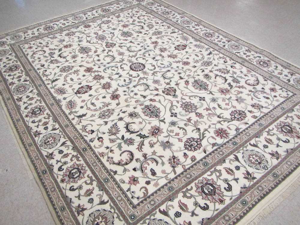 Appraisal: HAND KNOTTED ORIENTAL CARPET Indo-Persian overall Isfahan floral design on