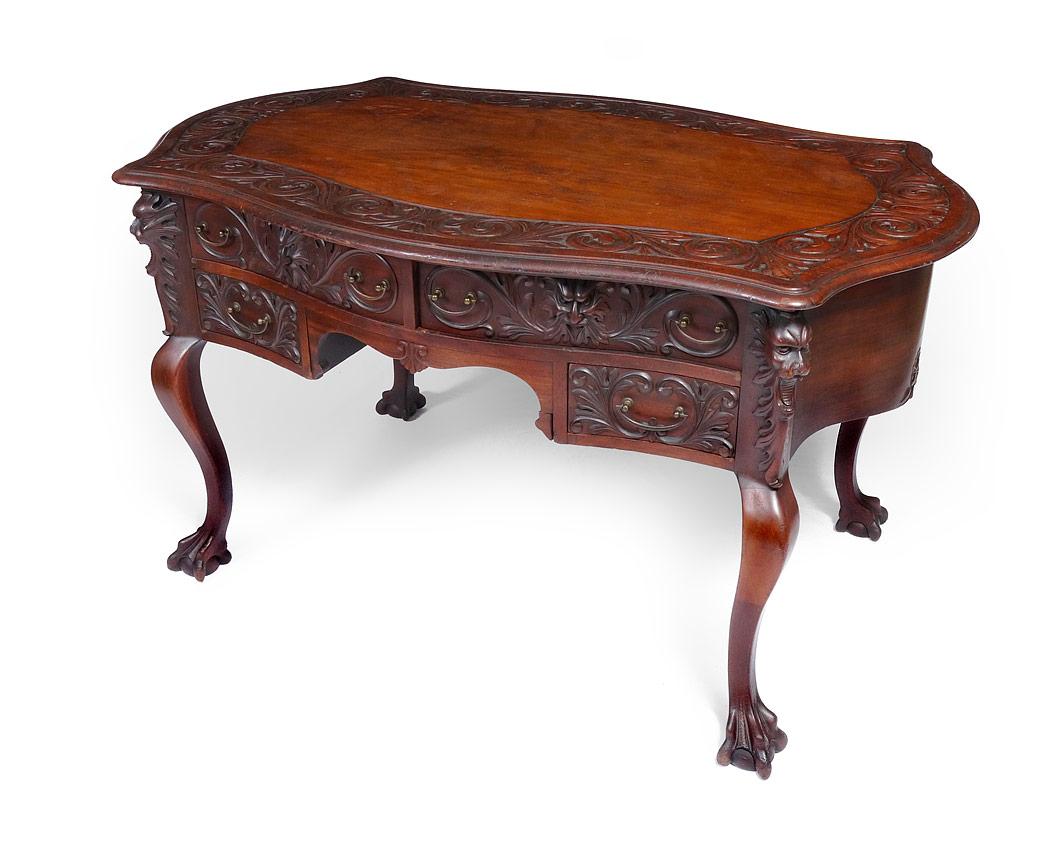 Appraisal: RJ HORNER CARVED MAHOGANY PARTNER'S DESK Overhanging serpentine top with