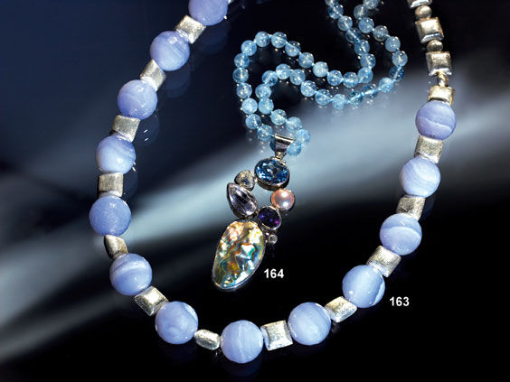 Appraisal: AQUAMARINE NECKLACE WITH MULTI-GEM PENDANT Brazil New Zealand Africa This