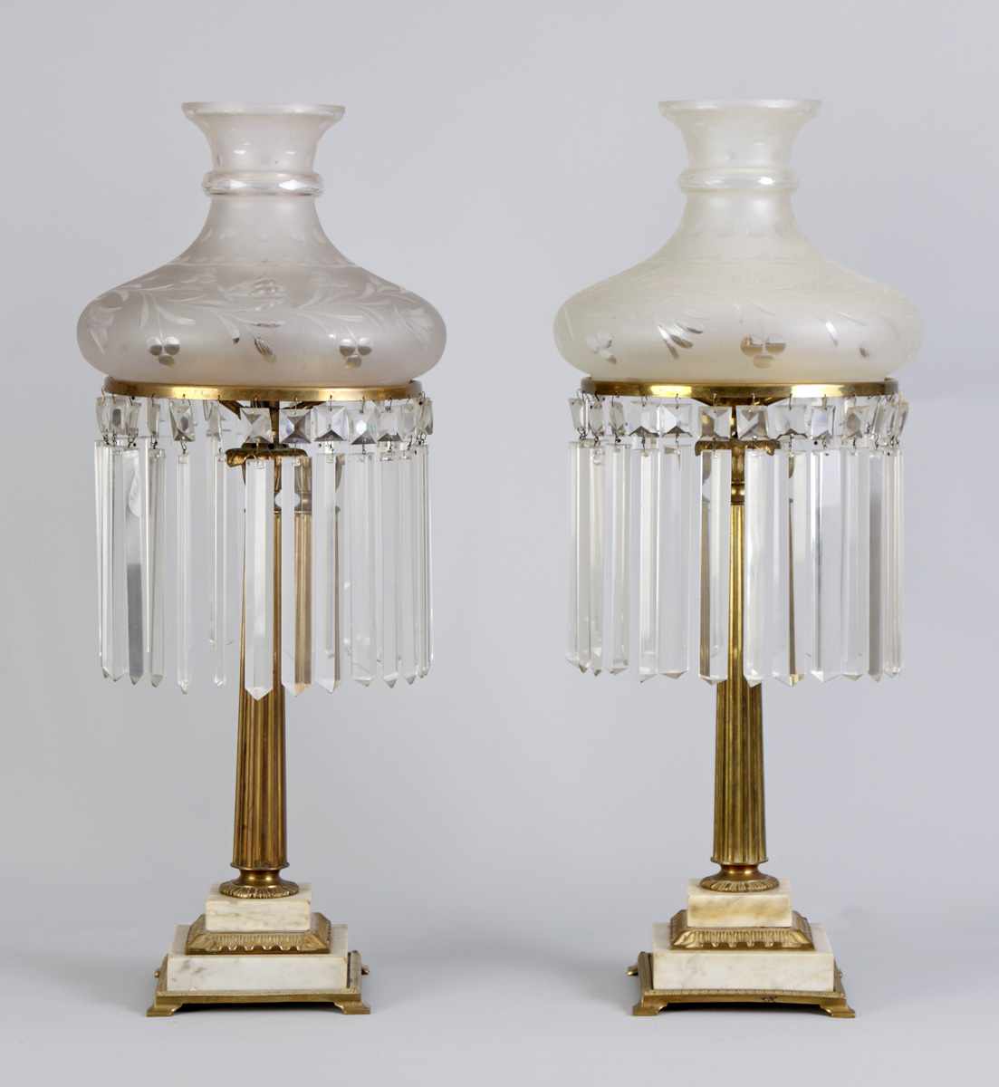 Appraisal: Pair of Sinumbra Lamps w Marble Brass Bases Engraved Shades