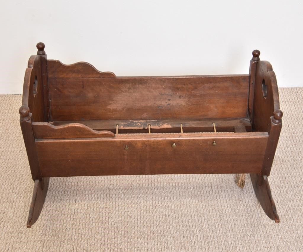 Appraisal: Walnut cradle th c with cut out heart and cheese