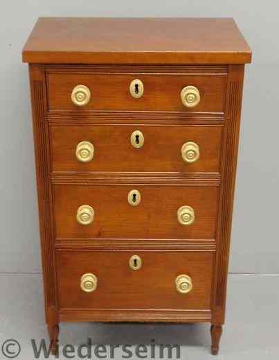 Appraisal: Miniature Sheraton cherry chest of drawers c with reeded stiles