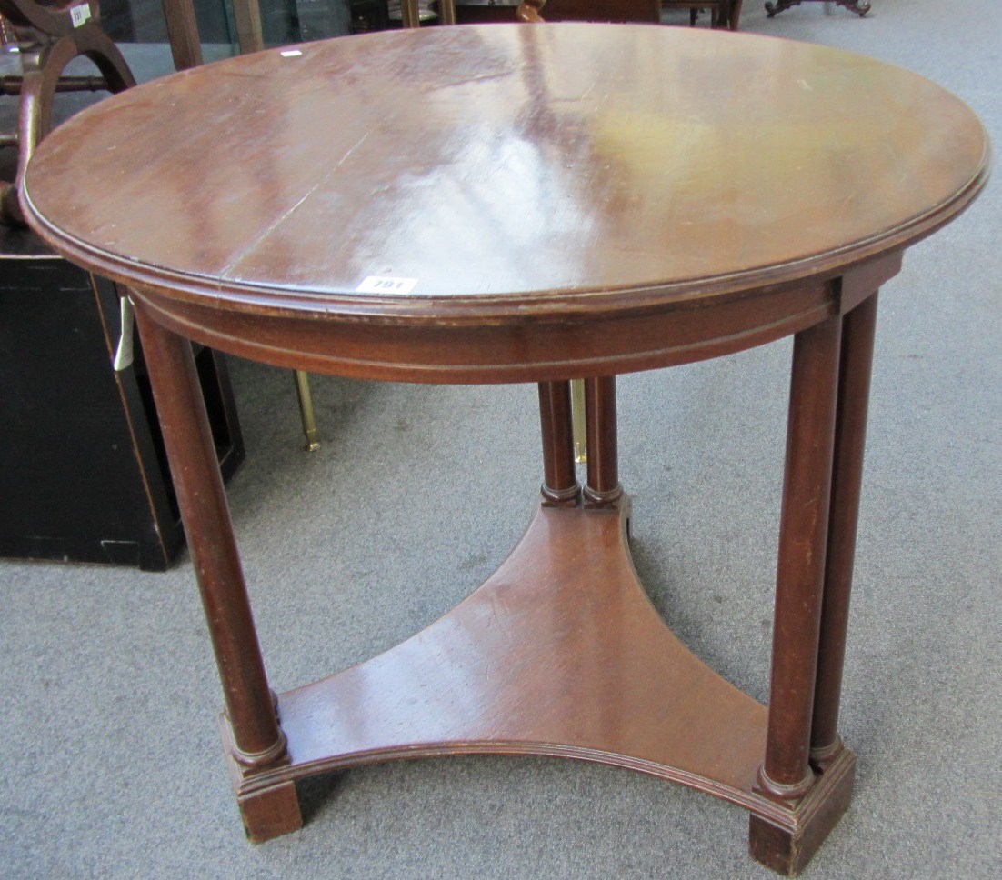 Appraisal: A th century French mahogany gueridon the circular top on