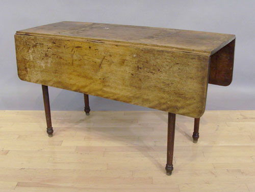 Appraisal: New England butternut drop leaf dining table mid th c