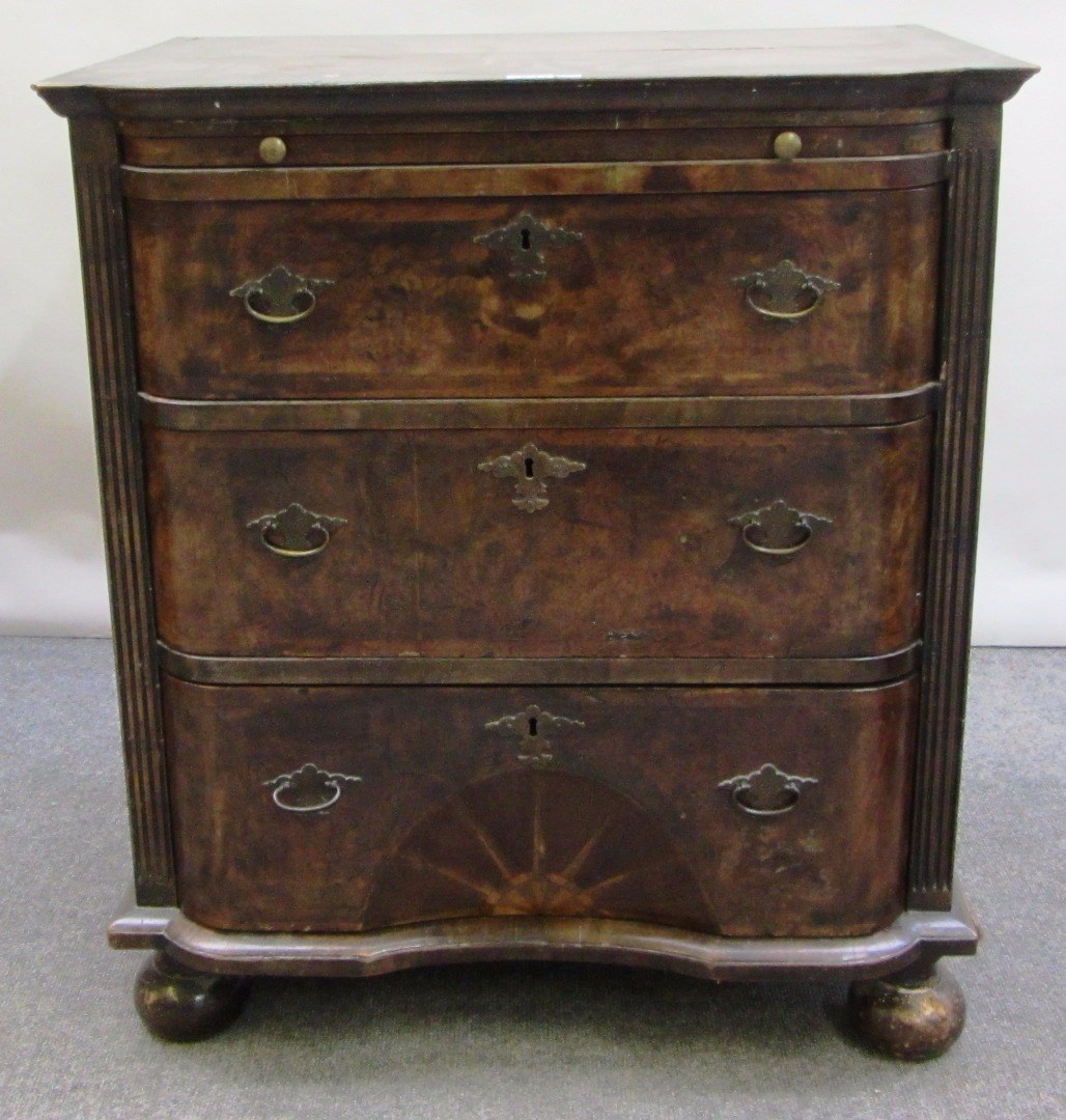 Appraisal: An th century style Continental figured walnut chest the brushing