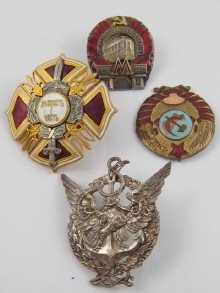 Appraisal: Four Soviet Russian badges comprising tram naval revolutionary and K