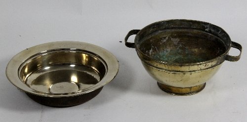 Appraisal: A bell metal alms dish cm diameter and a twin-handled