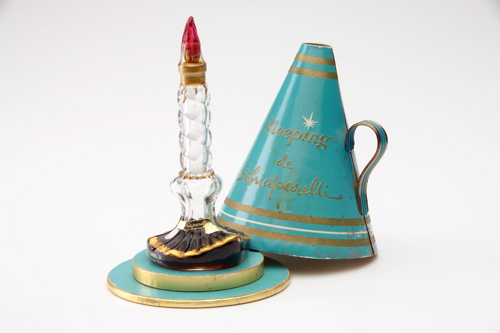 Appraisal: SCHIAPARELLI Sleeping perfume bottle in clear and red glass sealed