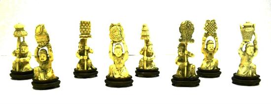 Appraisal: Eight ivory Asian carvings mythological figures holding Lotus Wheel of