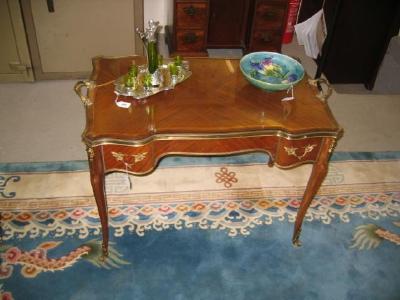 Appraisal: A FRENCH STYLE KINGWOOD LOW OCCASIONAL TABLE th century of