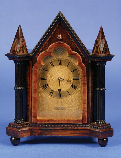 Appraisal: A REGENCY ROSEWOOD AND GILT GOTHIC STYLE BRACKET CLOCK the