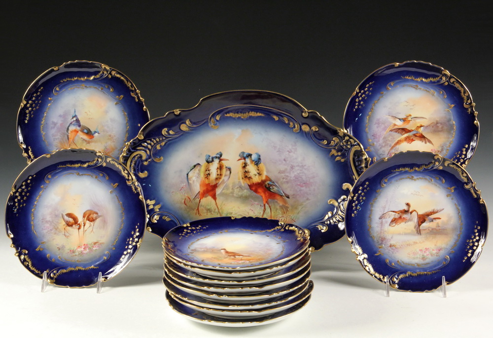 Appraisal: PC LIMOGES GAME BIRD SET - Consisting of Plates and