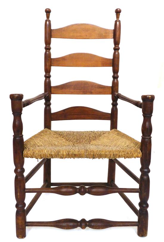 Appraisal: th th C American ladder back arm chair brown stain