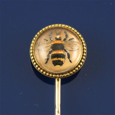 Appraisal: A late th century gold stick pin mounted with a