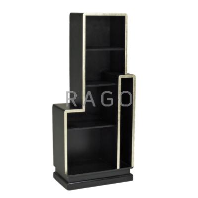 Appraisal: STYLE OF PAUL FRANKL Skyscraper-style bookcase USA ca Silvered and