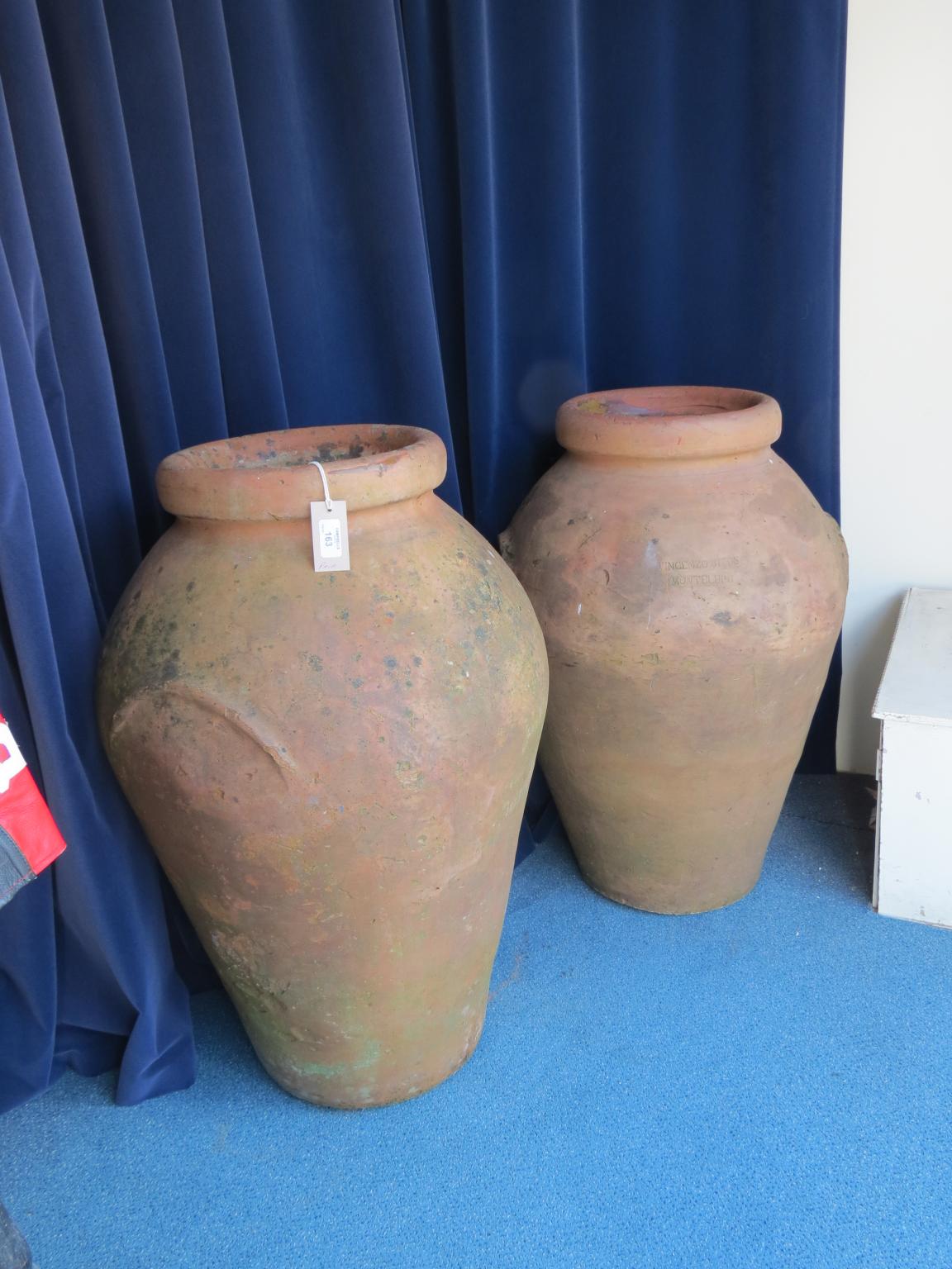 Appraisal: A pair of large Italian terracotta garden jars bulbous-shape ft