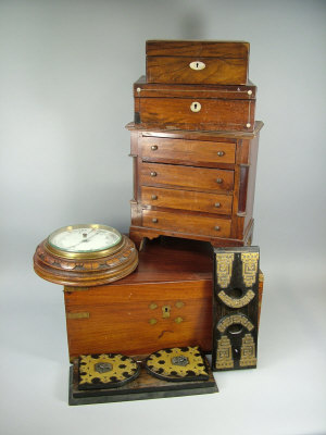 Appraisal: A mahogany miniature chest of four drawers early th century