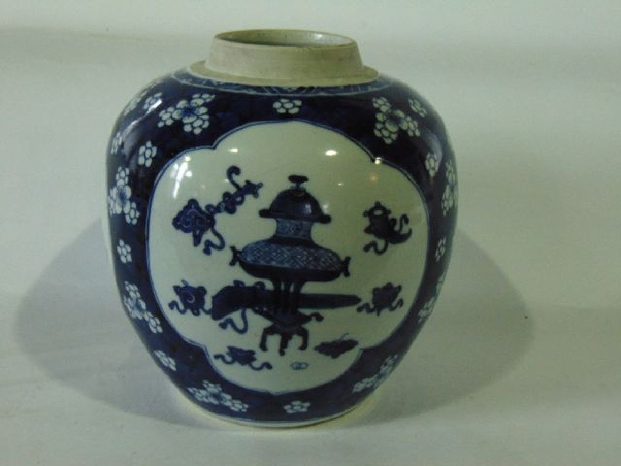 Appraisal: A th century oriental blue and white ginger jar base