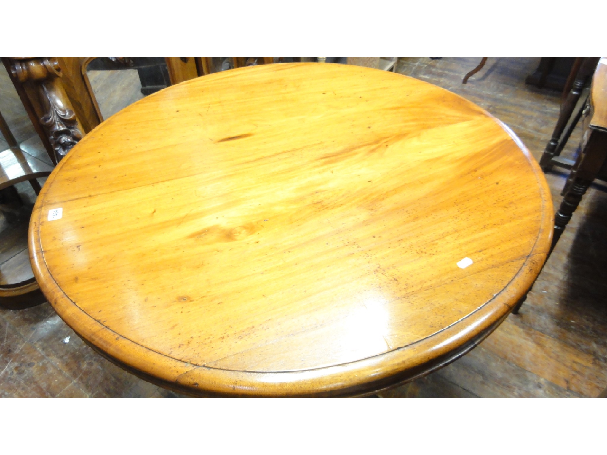 Appraisal: A th century mahogany tea table the circular top raised