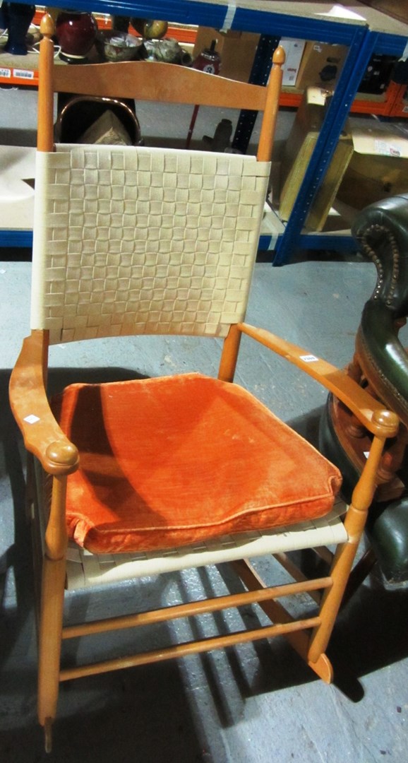 Appraisal: A th century beech framed rocking chair