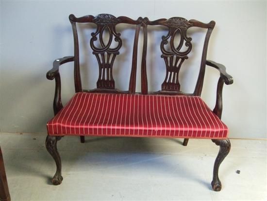 Appraisal: Early th century mahogany Chippendale style double armchair with pierced