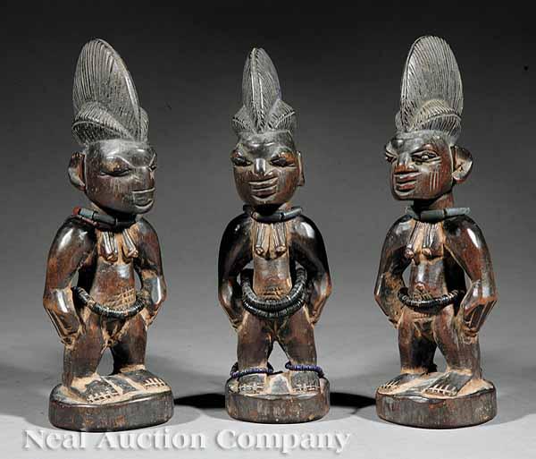 Appraisal: A Group of Five Yoruba Carved Wood Ibeji Twin Figures