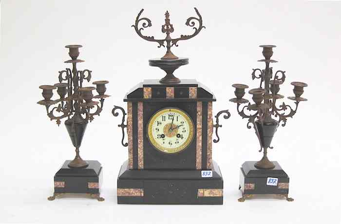 Appraisal: THREE-PIECE BLACK MARBLE CLOCK SET French early th century a