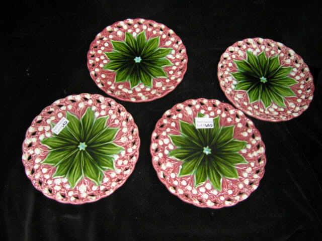 Appraisal: European Majolica Pottery Plates fancy openwork floral leaf decor