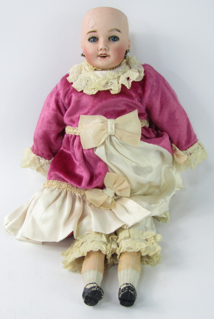 Appraisal: A Lanternier Cie bisque headed doll child form with pierced