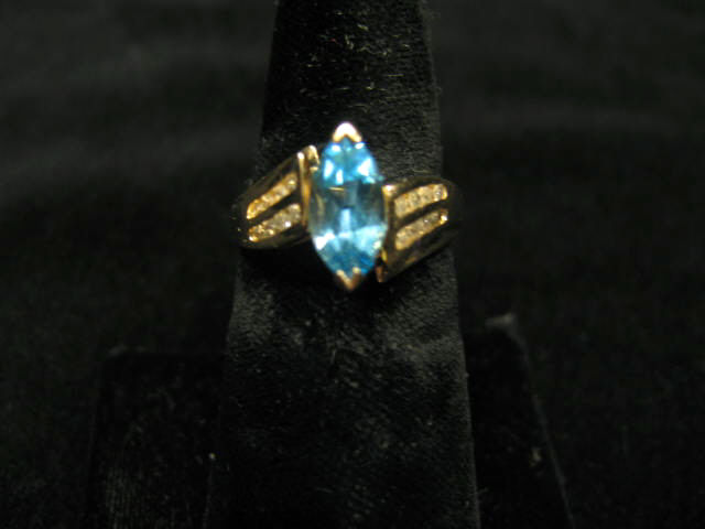 Appraisal: Blue Topaz Diamond Ring marquise cut gem with eight diamonds