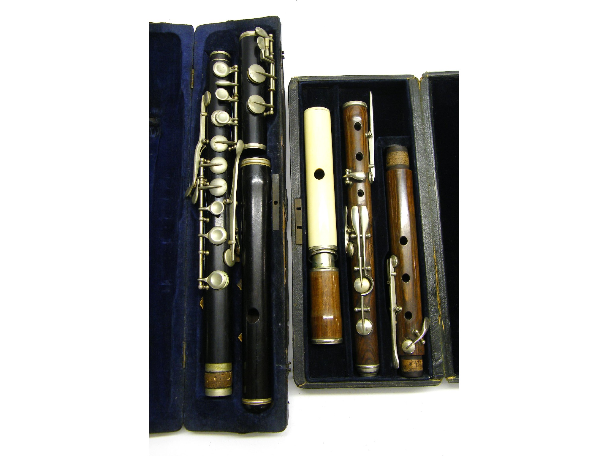 Appraisal: Eight keyed rosewood flute with ivory head joint case together