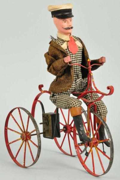 Appraisal: Early Tin Bicycle Clockwork Toy Description French Working Tin bicycle