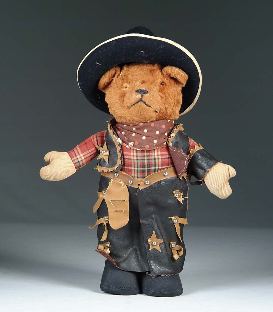 Appraisal: COWBOY TEDDY BEAR Small stuffed teddy bear outfitted with original