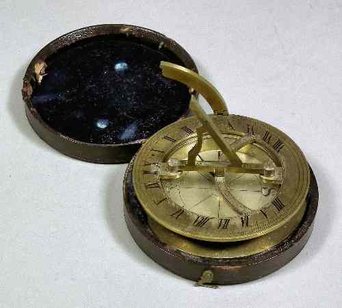 Appraisal: A th Century lacquered brass circular portable sun dial with