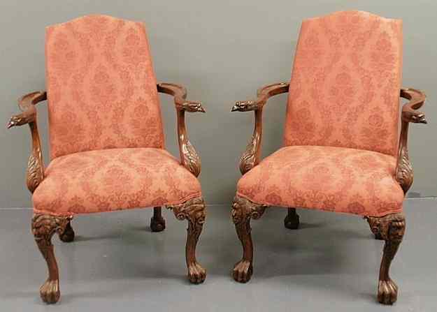 Appraisal: Large pair of mahogany open armchairs with carved eagle head