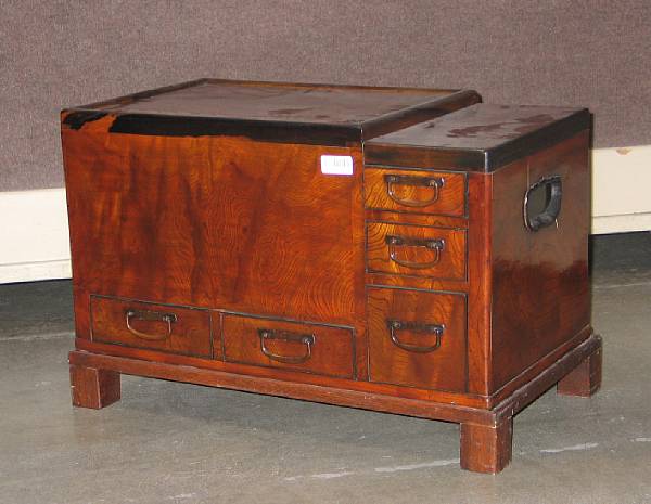 Appraisal: A Japanese mixed wood naga hibachi Fitted with five drawers