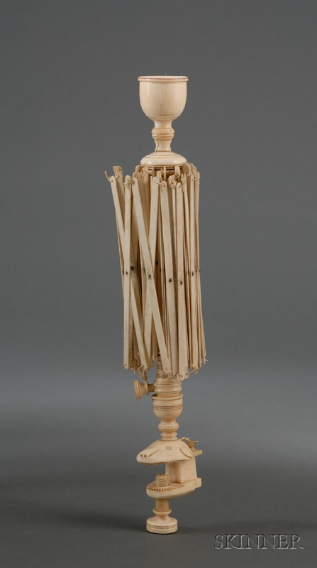 Appraisal: Whalebone and Ivory Yarn Swift mid- th century with turned