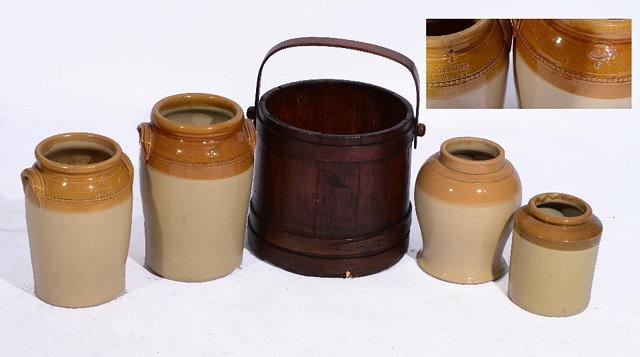 Appraisal: A COOPERED OAK BUCKET with swing handle cm high and