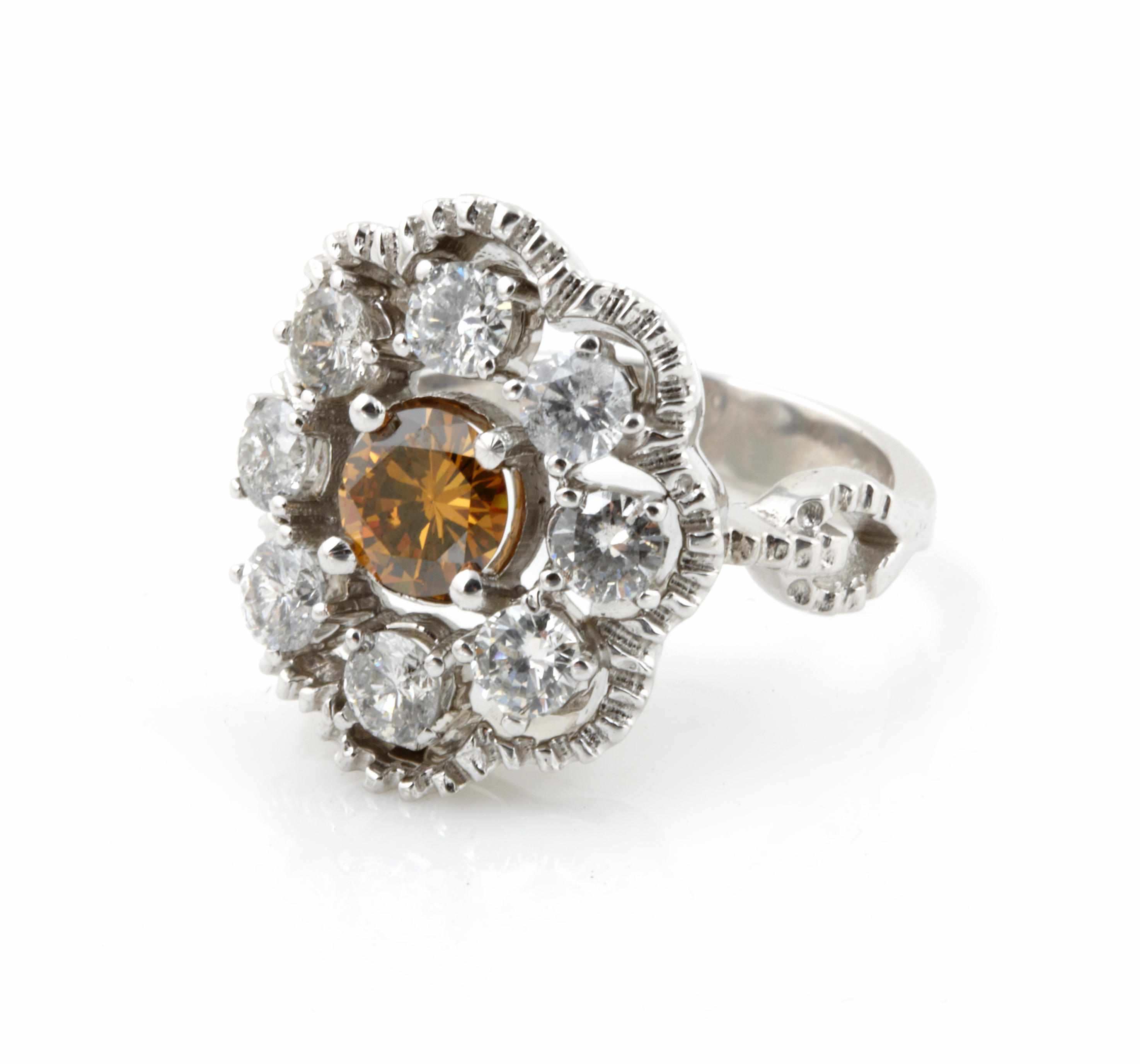 Appraisal: A colored diamond diamond and k white gold ring estimated