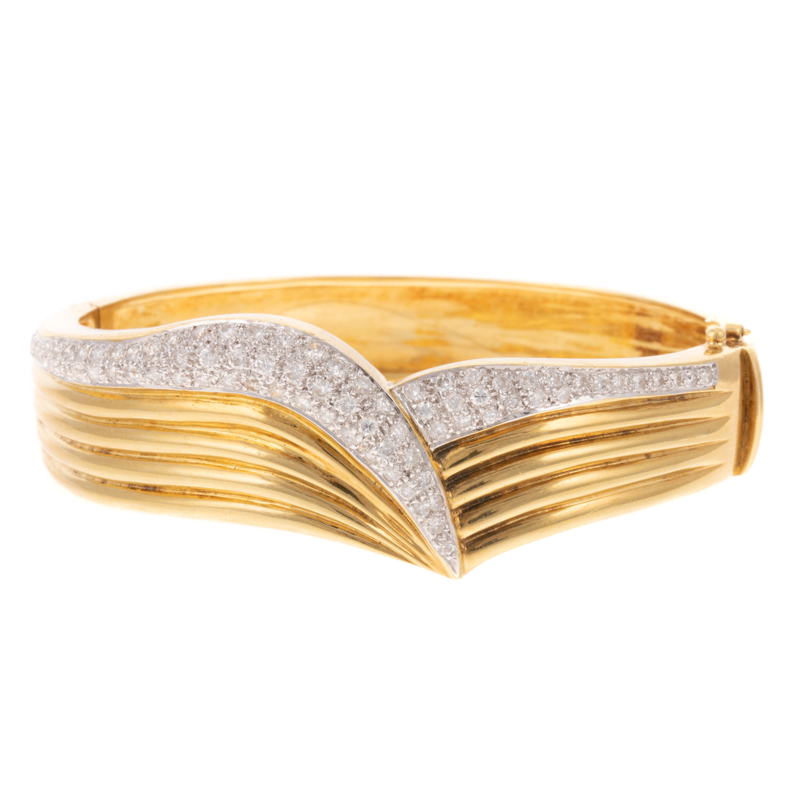 Appraisal: A PAVE DIAMOND HINGED BANGLE IN K K yellow gold