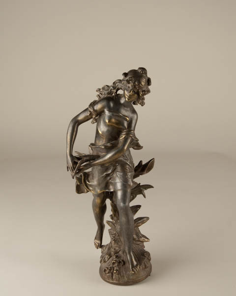 Appraisal: Art Nouveau Metal Clock Statue of Maiden figure by itself