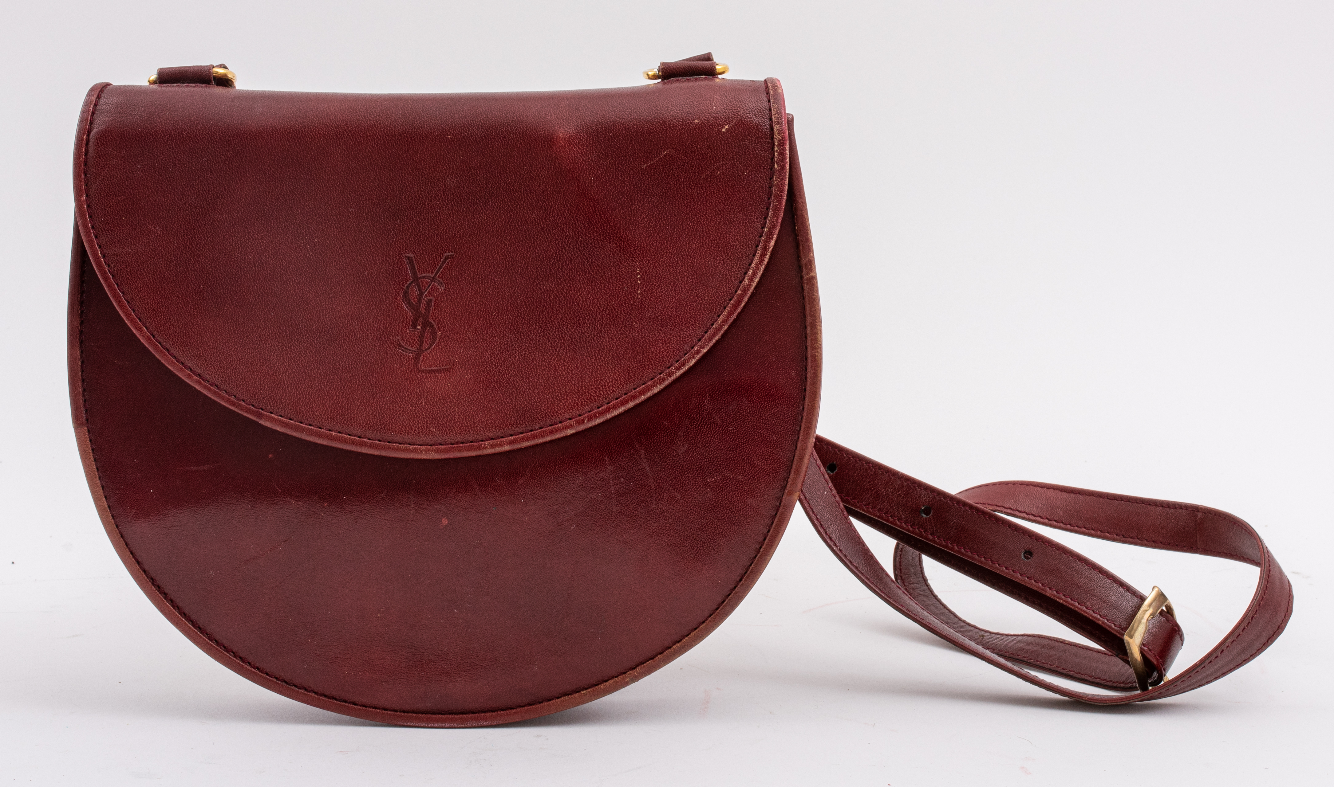 Appraisal: YVES SAINT LAURENT BURGUNDY LEATHER PURSE Yves Saint Laurent burgundy