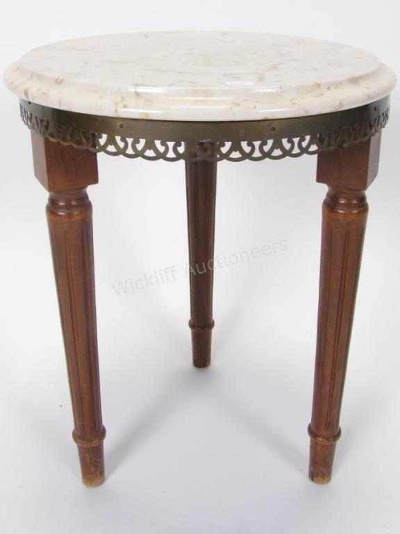 Appraisal: A French style accent table with brass gallery marble top