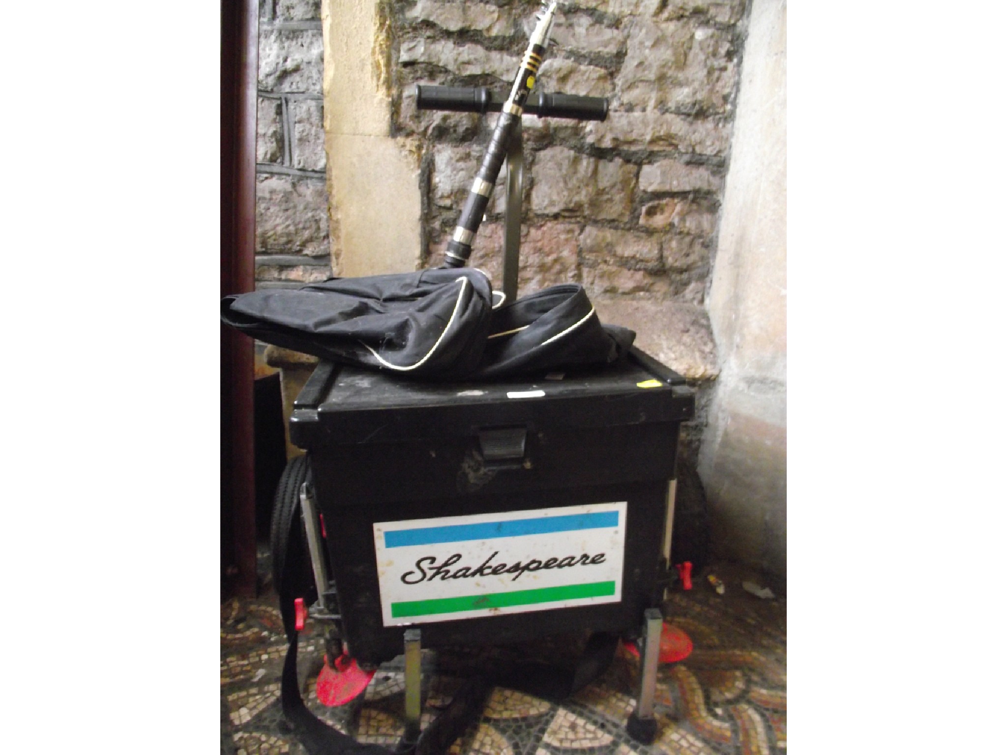 Appraisal: A Shakespeare tackle box containing sea fishing tackle complete with